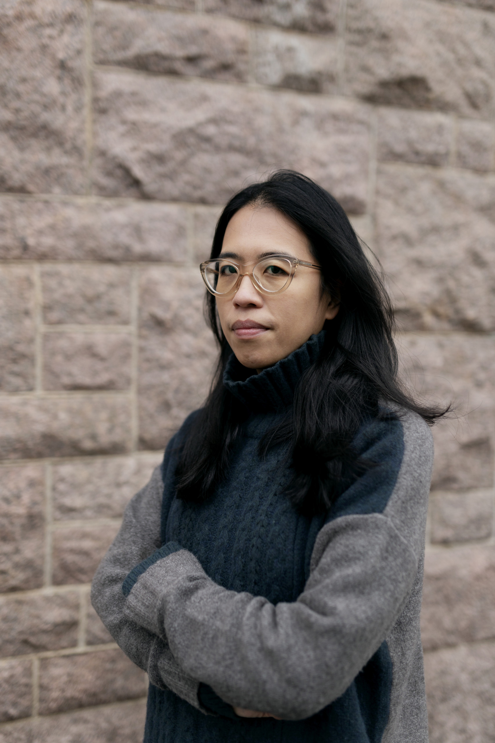 Portrait of Christina Li. She is subtly smiling to the camera.