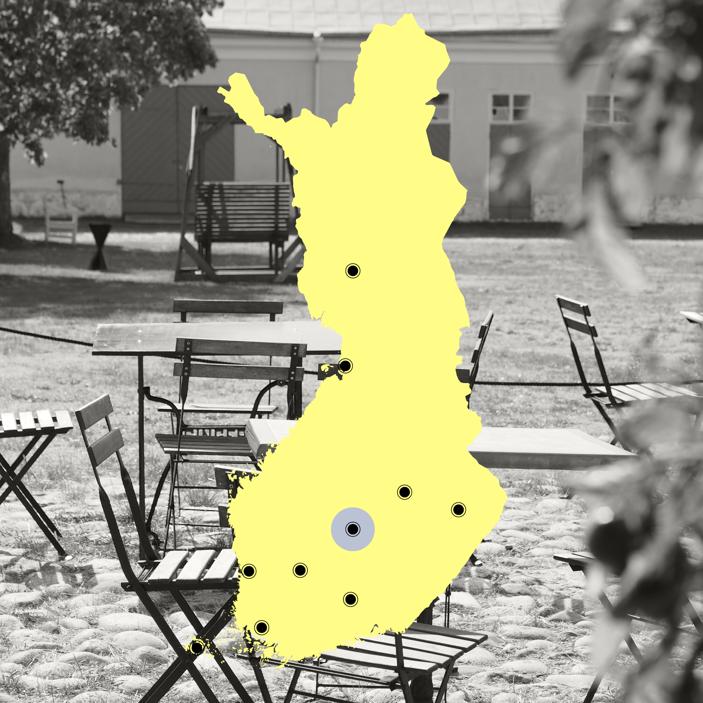 A graphic yellow map of finland lies flat on top of a black and white image of chairs outdoors on a sunny day, with a traditional building in the background.