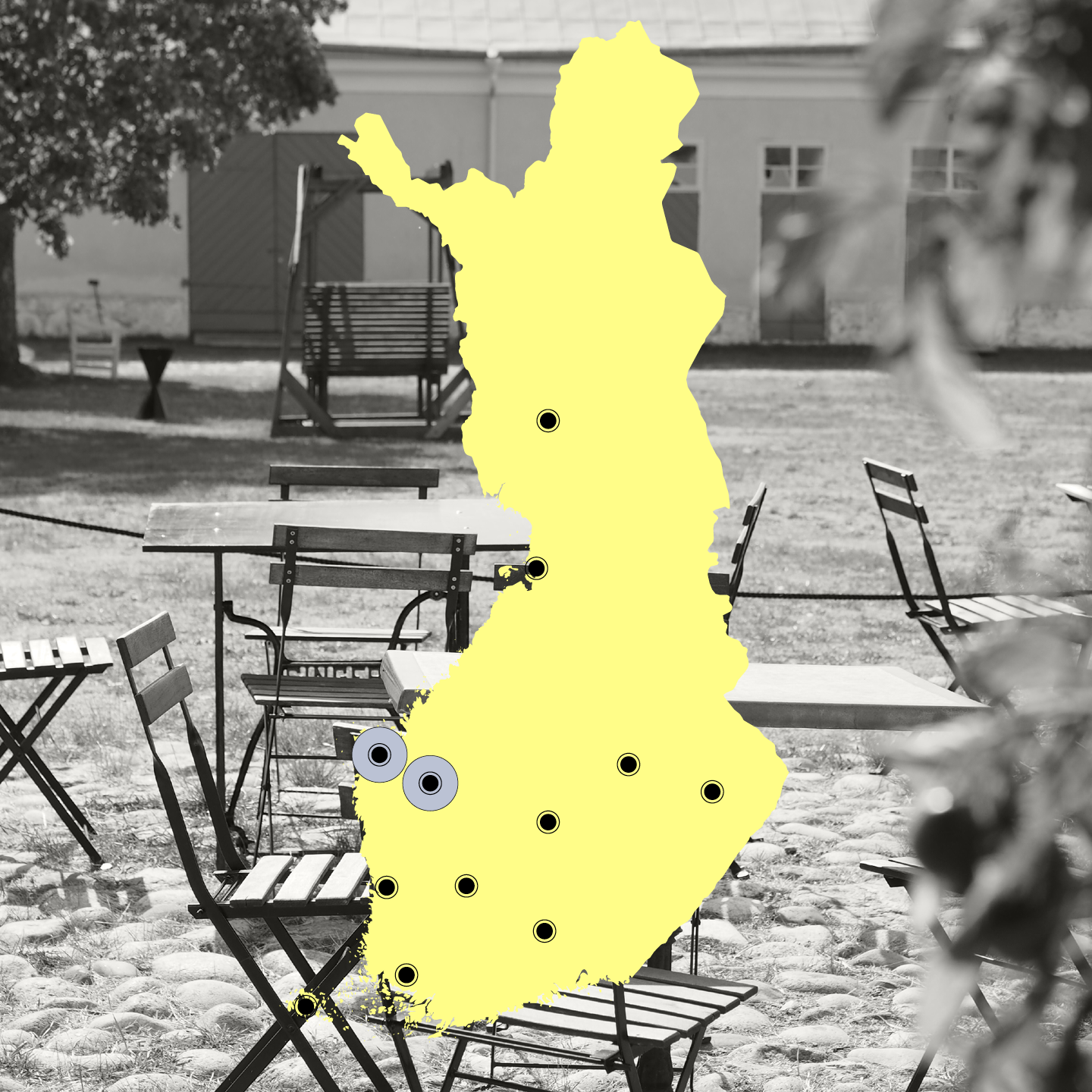An image of the map of Finland, with Vaasa and Seinäjoki highlighted. In the background, there is an image of some chairs and tables outside.