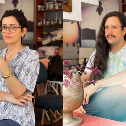 On the left is a light skinned person with dark short hair wairing glasses and on the right side a person with long dark hair and a moustache wearing glasses.
